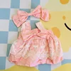 Pink polka-dot strap dress hairband