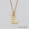 (Gold) letter L (including chain)