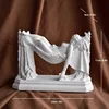 Cradle goddess statue