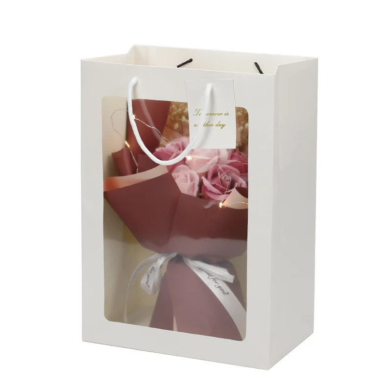 Подарочный бумажный пакет индивидуальный дизайн ленточная ручка на заказ с принтом