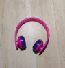 Casque audio rose rouge et jaune