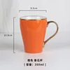 Bright orange gold-plated handle