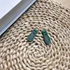 Green Side-Hole Leather Strap End
