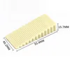Small beige triangular door stop
