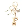 Porte-clés petit papillon doré-F
