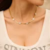 B104 gold white shell Daisy necklace