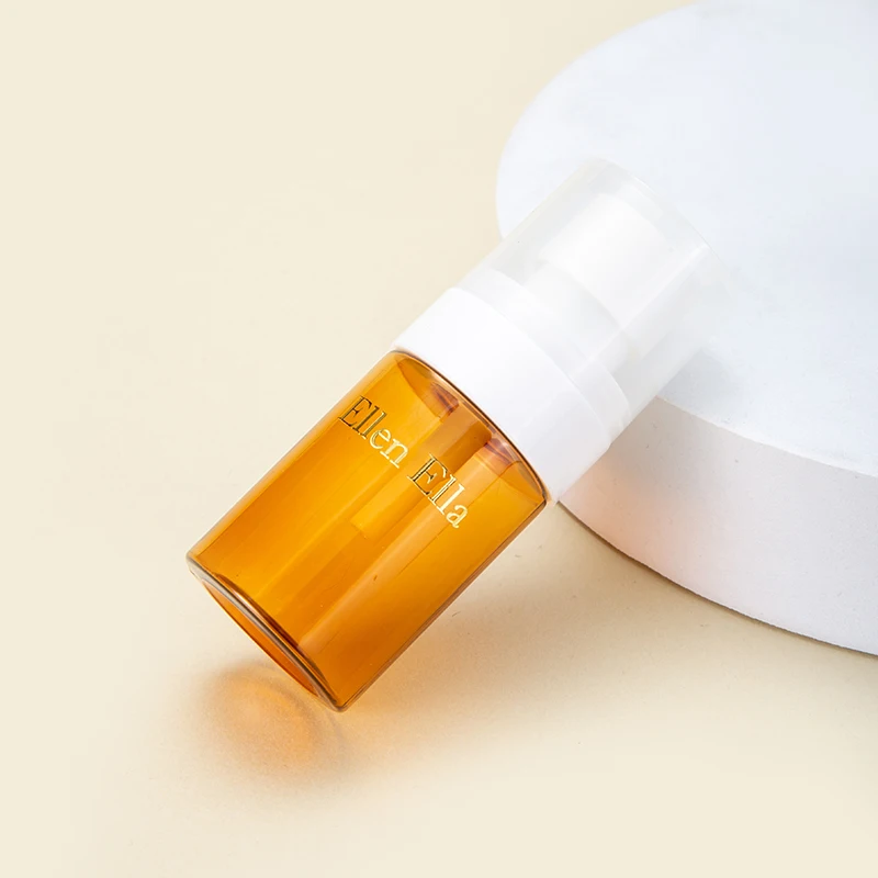 Portable Empty Cylindrical 30ml 60ml Small PET Plastic Bottles Lotion Orange Transparent Cosmetic Pump Bottle supplier