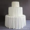 Mesa de seda de leche blanca cubierta de la tabla