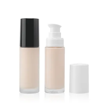 Wholesale Cosmetic Makeup 30ML Flat Shoulder Round Glass Bottle Clear Foundation Lotion Pump Bottle Packaging Manufacturer