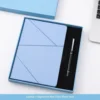 Set de dos piezas de bolígrafo y cuaderno azul cielo