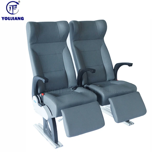 Luxury train passenger seat with USB charger & front leg holder