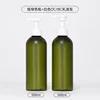 Matte green bottle with white lotion pump