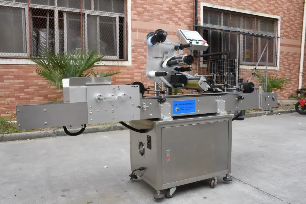 Factory Direct Price Automatic Pagination Labeling Machine Clothing Tag Labeling Machine Paper Box Labeling Machine