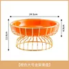 [Grande assiette de fruits orange] en fer forgé
