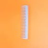 Silver-wide-tooth comb