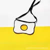 Tie-on bib fried egg