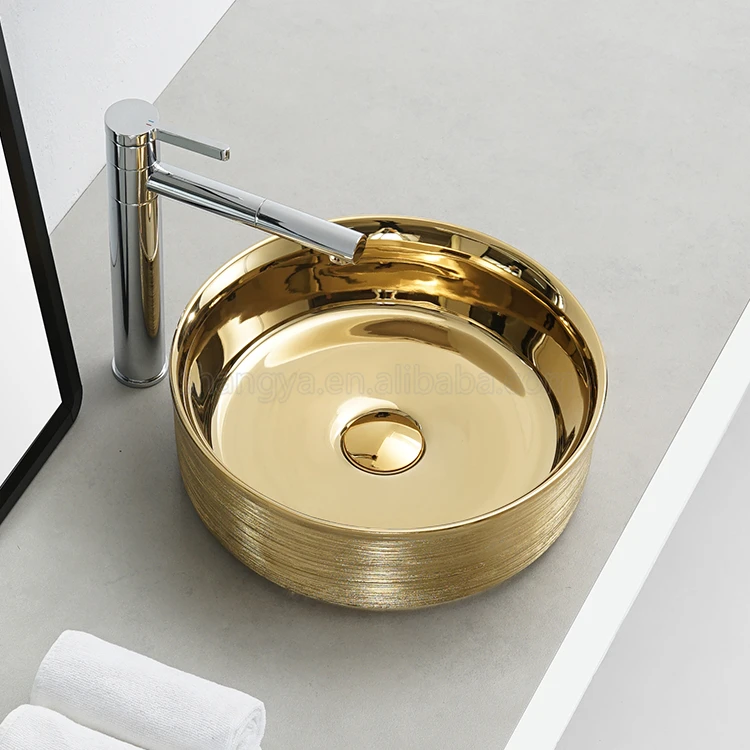 Round golden plated luxury ceramic sanitary wares table counter top washbasin bathroom sink art basin gold face hand wash basin factory