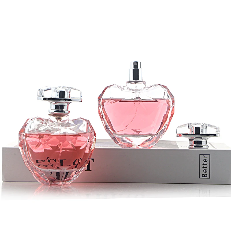 ユニークなデザイン 100ml ハート型香水ポンプボトル クリスタル香水蓋