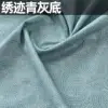 Embroidered pattern on gray background