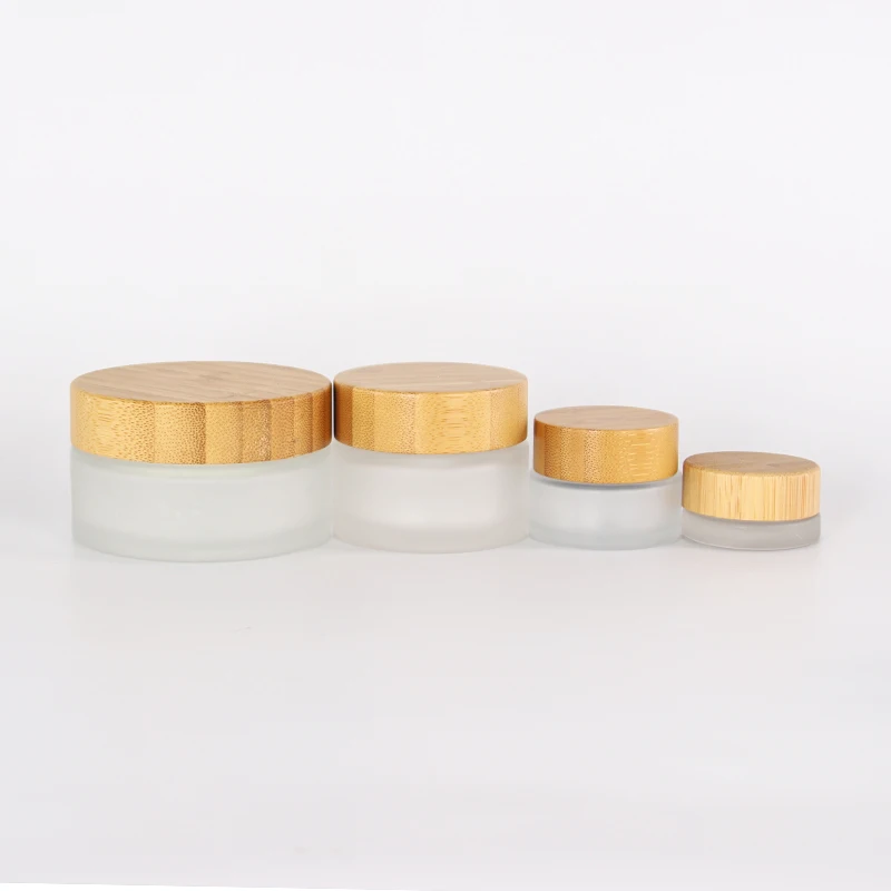 Hot selling natural 100g 50g 30g 15g 5g engravable frosted glass cosmetic facial cream jar with bamboo lid