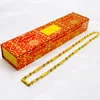 Collana in oro con fiore di gipsofila, completa di confezione