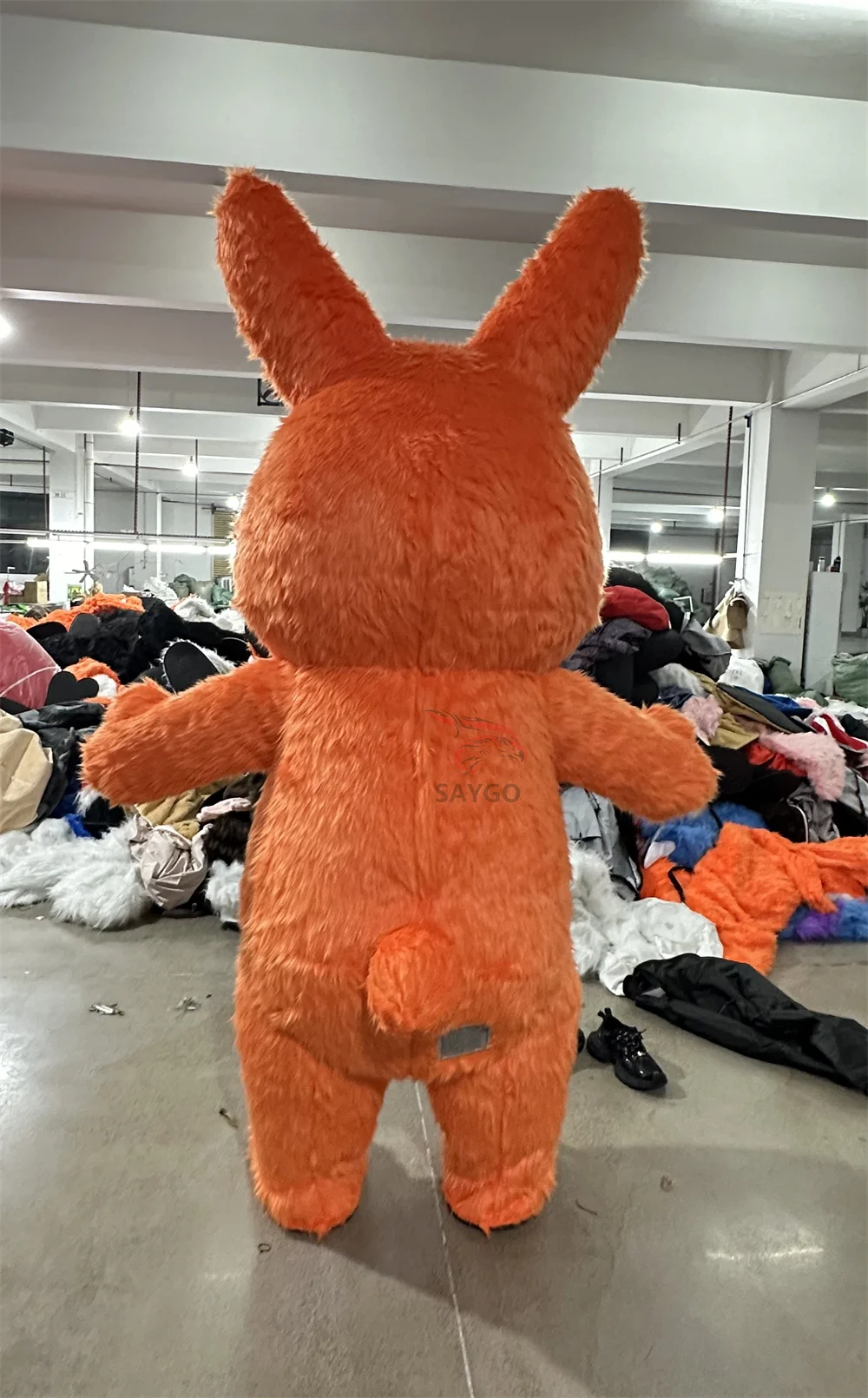SAYGO Giant Walking Moving Cosplay Cartoon Long Plush Fabric Furry Bunny Inflatable Rabbit Mascot Costume Suit for Adults