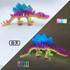 Estegosaurio luminoso de colores de 18 cm de largo.