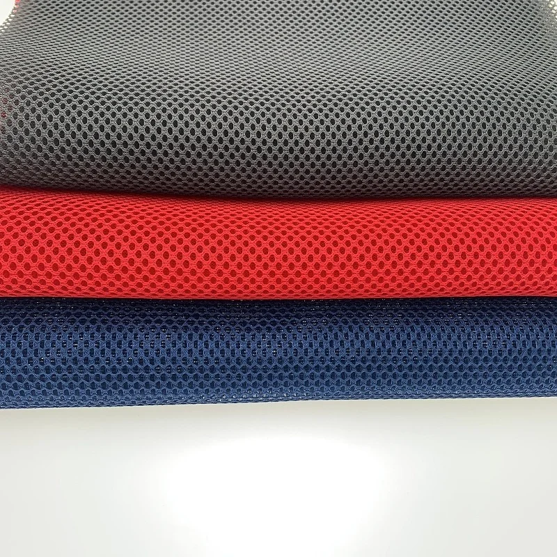 Polyester 3D spacer mesh with knitted backing