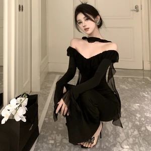 Evening Dress Features a V - Neck Design with Ruffled Details and Sheer Fabric Accents Creating an Elegant and Glamorous Look