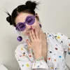 Purple disco hanging-ball glasses