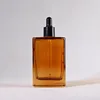 Brown flat-mouthed bottle
