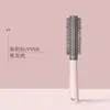 Pink curling comb
