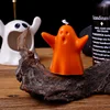 Warmly embrace the orange ghost scented candle