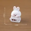 colorful Three little rabbits holding up signs