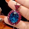 Blue pointed crystal pendant with box chain