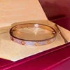 3 file senza diamante principale in oro rosa