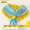 Yellow drool towel - covered in small flowers