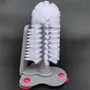 Brosse à double embout pour cheveux blancs (ventouse rouge)