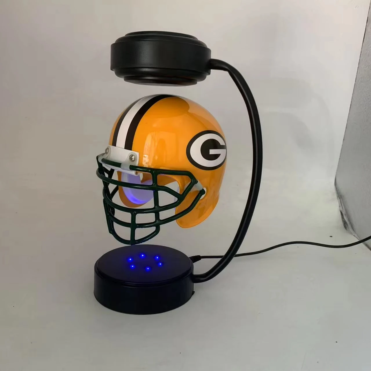 floating football helmet lamp Ole Miss Rebels NCAA Hover No wires or tricksthis captivating effect is all thanks to the power of electromagnetic force McBean Hover Helmet - Magnetic
