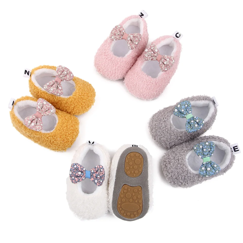 Autumn and Winter 0-1 Year Old Baby Solid Color Fluffy Cute Bow Warm Soft Soled Cotton Shoes factory