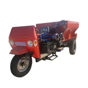 newest cheap self-propelled three-wheeled manure spreader/chicken and cattle feed spreader truck mounted