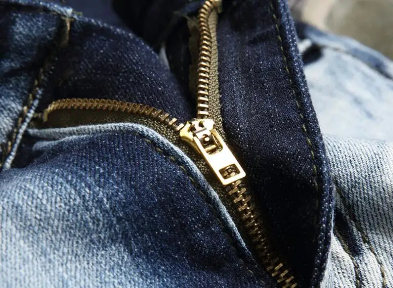 Wholesale slim fit elastic camouflage patchwork denim pant men's fashion trend small leg jeans