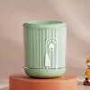 Verde di piccole dimensioni in stile cartone animato
