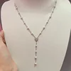 Collana con ciondolo a cuore in argento con nappina e perla