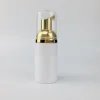 White bottle+gold pump