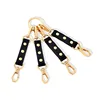Ganci in pelle
