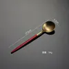 Red dessert spoon