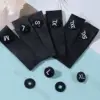 Bouton noir en coton mat