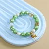 Pulsera de rueda de oración con mantra de seis sílabas - Verde maca