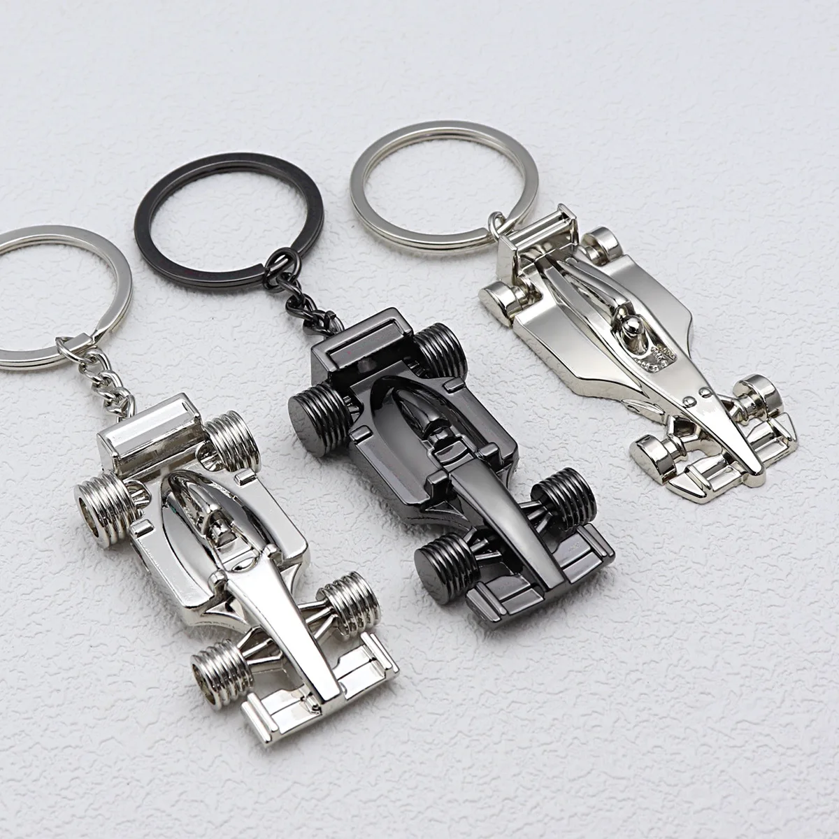 Custom Sublimation Personalized 3d Metal Keyring F1 Racing Key Chains Business Gifts Metal All-Wheel Car Keychain
